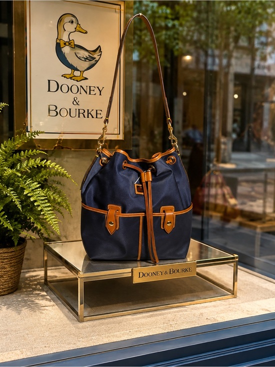 Dooney & Bourke Handbags - Dooney & Bourke Navy and Tan Leather-Trim Bucket Shoulder Bag